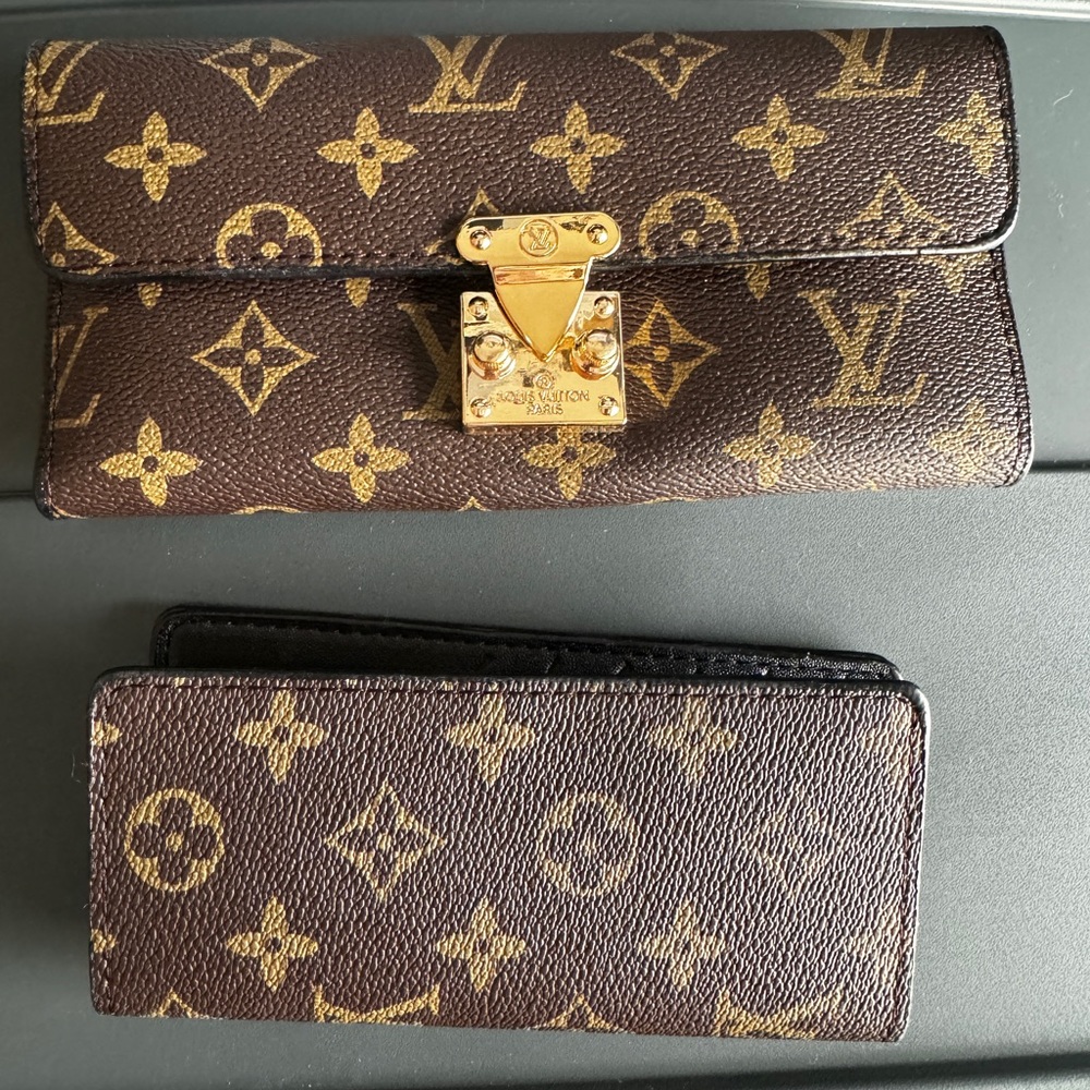2 brown Wallets